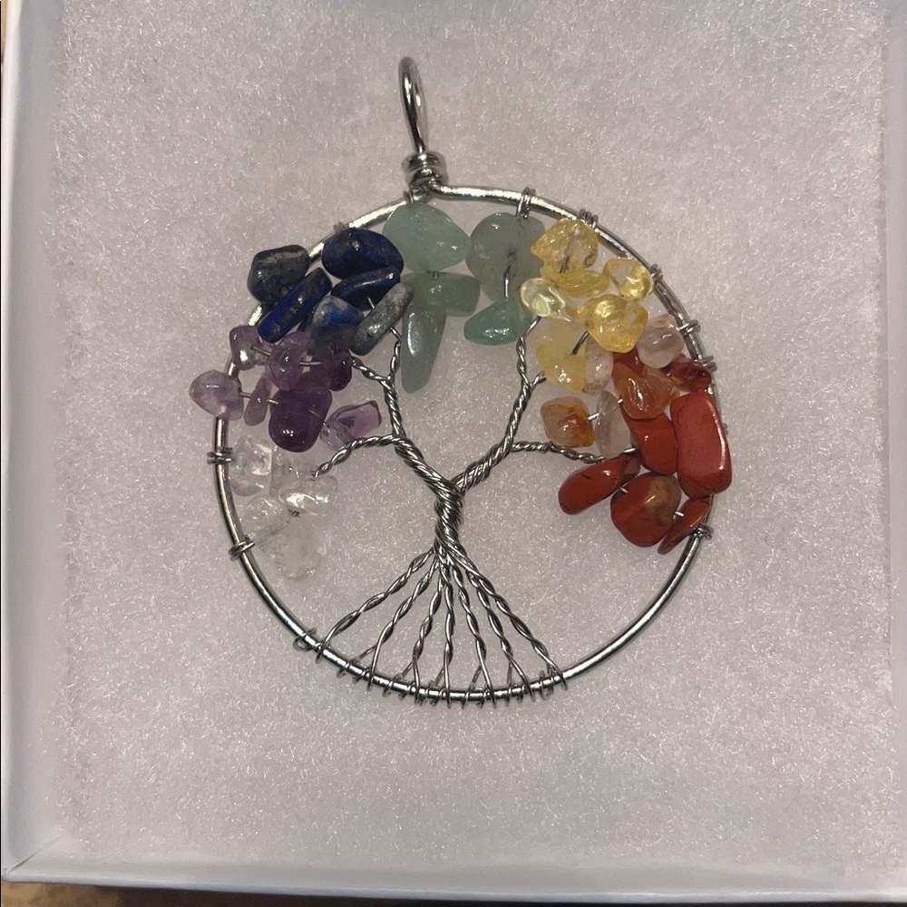 Tree of life pendant with stone chips.